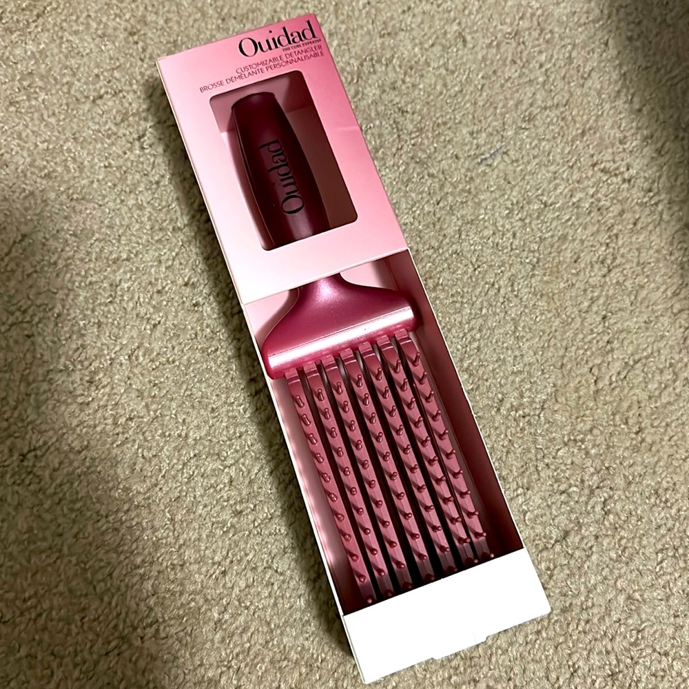 New In box Ouidad detangling brush with removable bristles